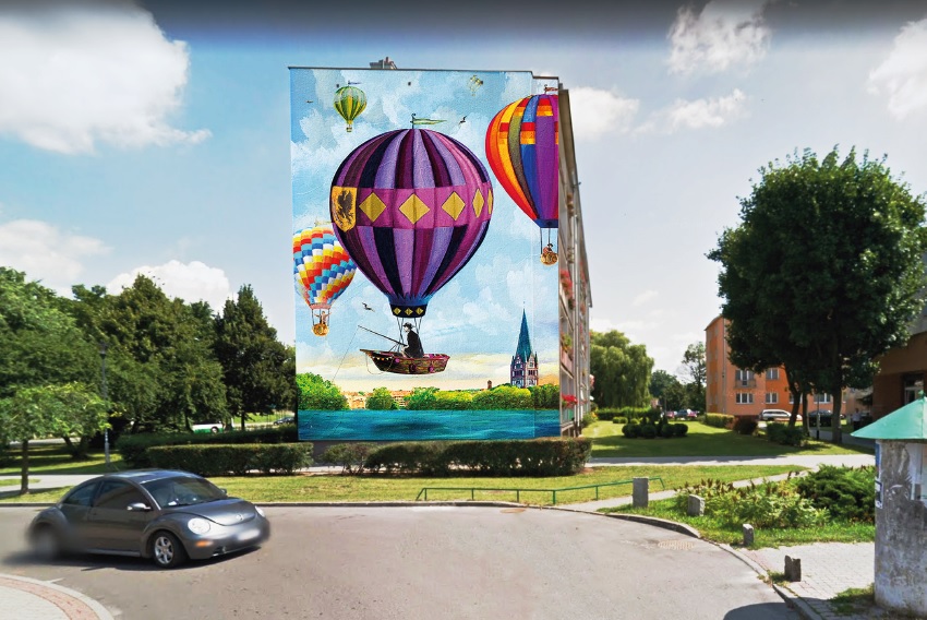 Zdjęcie przedstawiające mural na którym jest widoczny lot balonem z dalszej perspektywy